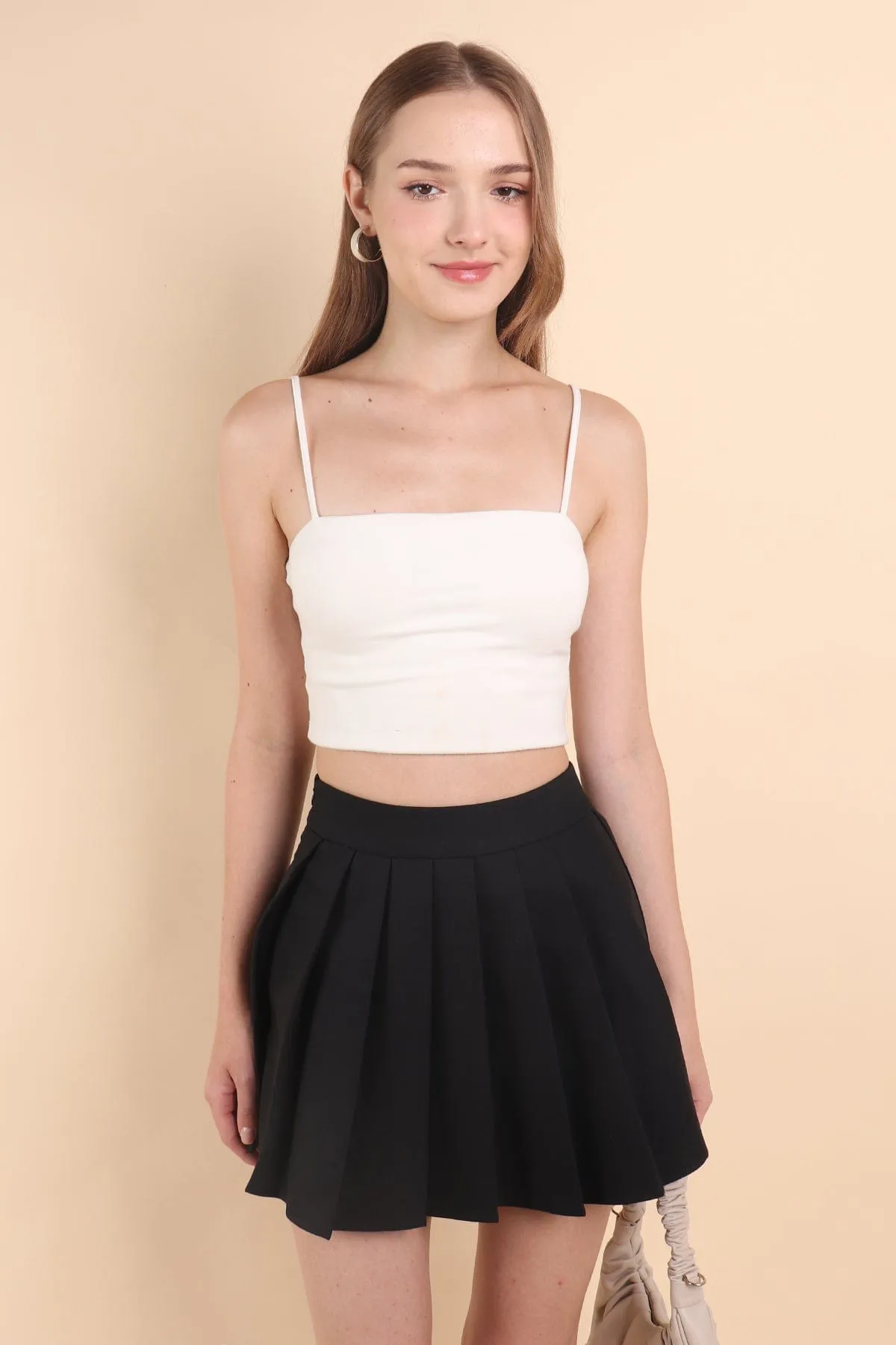 RESTOCKED** CAMU PLEATED SKIRT IN BLACK